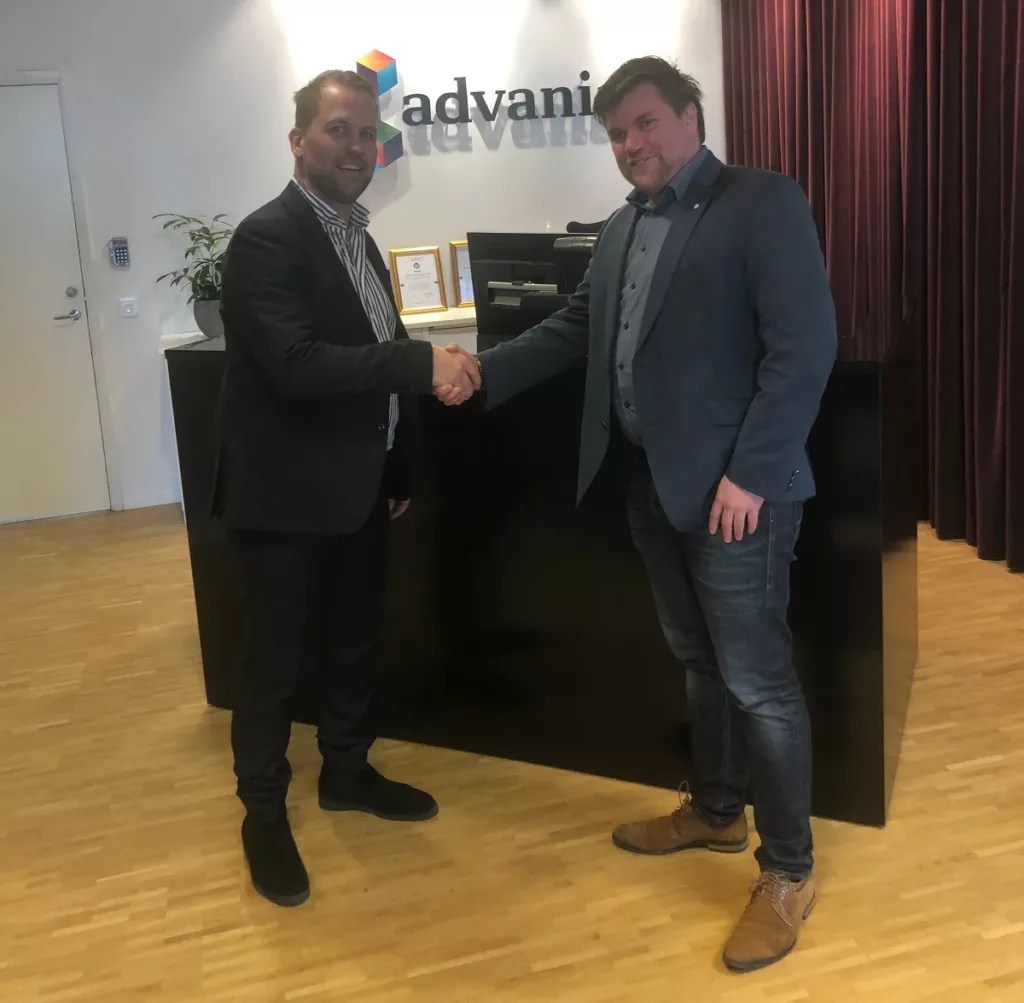 Handshake between App4mation and Advania director - strategic partnership